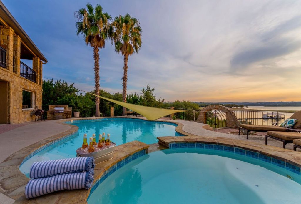 Photo of a Lavish Austin Vacation Rental's Pool Area. Click Here to Learn More about the Finest Lakes in Austin, Texas, Area.