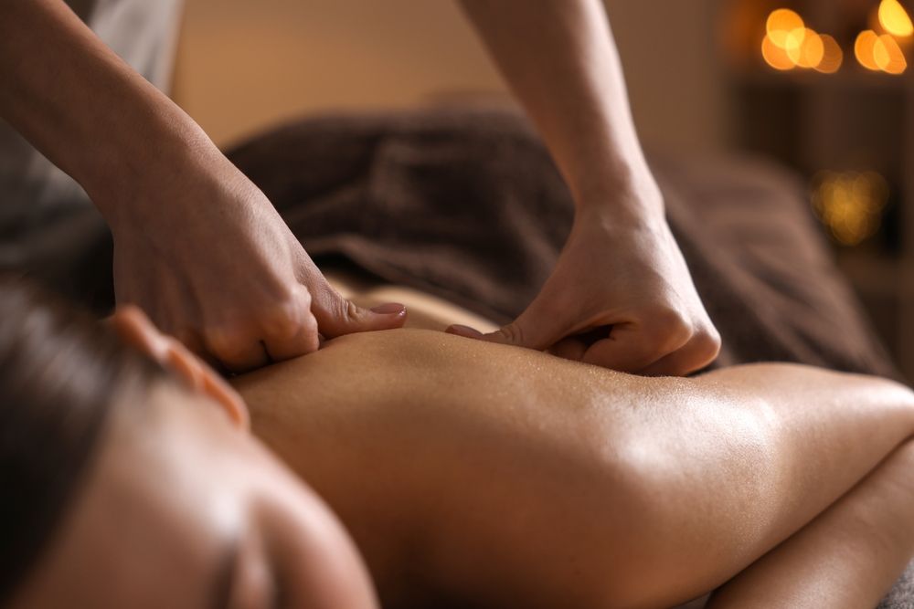 woman getting a massage on her back